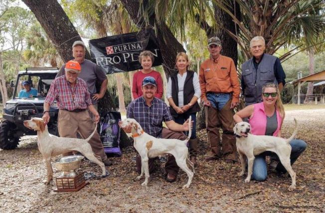 Derby Winners. Left: Don Wood w/Funseeker Double Trouble & Derby Bowl; Justin Muzynski & Holopaw Rear Axel, Kayleigh Muzynski & Holopaw Mack. Behind: Dave Vernasco, Dianne Cernasco, Carol Muzynski, John Milton and Paul May