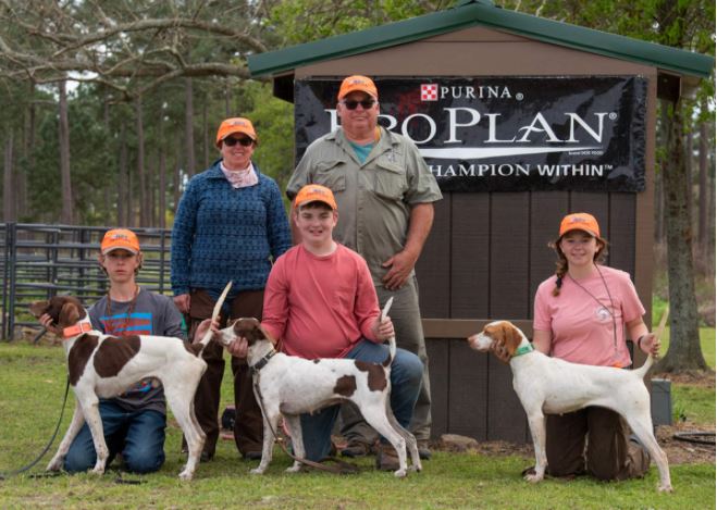 The Winners. From left: Hammering Hank with Noah Tomlinson, Ellie with Flint Hendley, and Goldie with Daley Dalton. Standing: Judges Mary Ann and Jim Womack