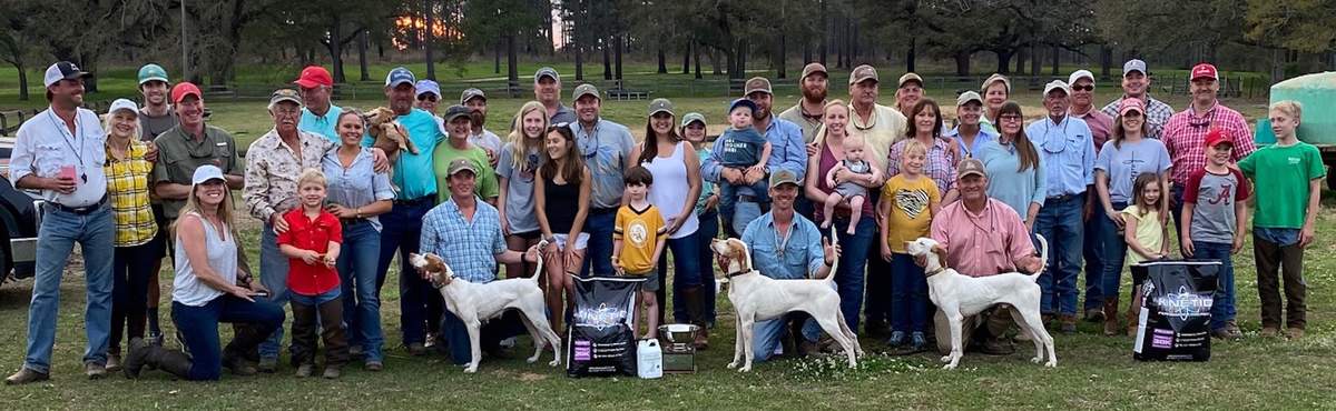 Open Shooting Dog Stake Winners. From left:  First place winner Snapback with Daniel Ward; Second placed  Melrose Rebel Heart with Andrew Bozeman, and third Nonami's Johnny Come Latelywith Ray Pearce, joined by Judges Wallace Reed and L.J. Lundstrom