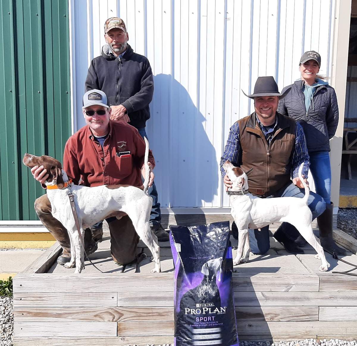 The Winners. From left: Chris Cantanzarite with Springflow's Backvountry P, and Lane Hodges with One Day La Bandita. Behind: Judges Jack Alexander Crystal Alexander