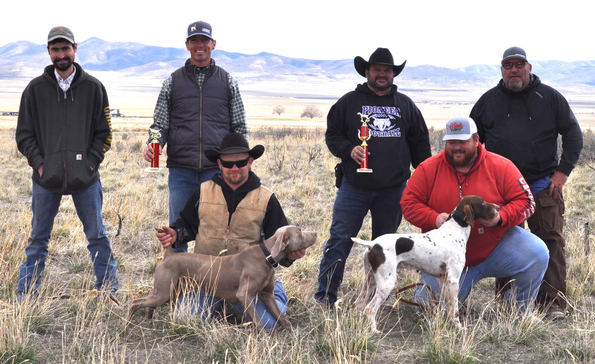 Open Shooting Dog Winners:  From left: Dustin Hamilton with second placed Westends Killin Me Small; Trenton Clement with first place Rock Hard's Three Day Bender.  Standing: Judge Chris Perkins; Mat Blockovich, Art Cox; and Judge Tom Kosmack